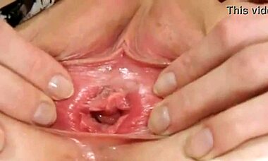 She SPREADS her WET PUSSY wide open in close-up.