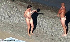 Dark-Haired Minx Unleashes Raw Passion Naked on Beach