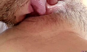Man, check this extreme close-up of eating an amazing young unshaved squirting pussy!