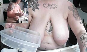 so, this housewife is doing the dishes naked, showing off her big tits and nipples, it's so exhibitionist and hot.