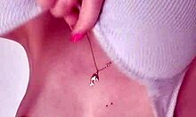 preparing for a swim in the pool with blue eyes and long hair