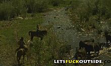 Cute Brunette with Big Boobs and Blonde Partner Engage in Public Fucking Outside the Car.