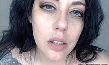 Blue-eyed brunette masturbates huge tits on webcam