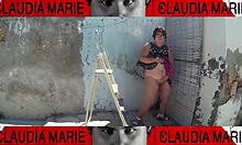 Removing panties from curvy woman for oral sex against wall