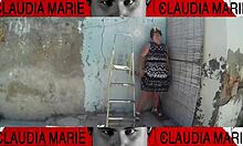 Removing panties from curvy woman for oral sex against wall