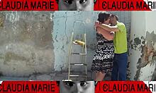 Removing panties from curvy woman for oral sex against wall