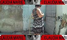 Removing panties from curvy woman for oral sex against wall