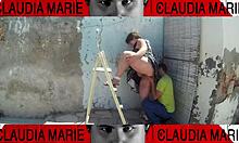 Removing panties from curvy woman for oral sex against wall