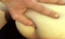 This amateur babe gets a huge load dumped on her ass at home