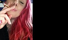 Garota sensual smokes and teases with big natural tits