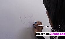 Ebony brunette Cali Sweets gives blowjob at gloryhole with shaved pussy