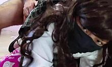 Is this schoolgirl undressing in the hotel?