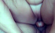 In the backyard, a guy with a monster cock fills his girlfriend's pussy while she rides him hard, leading to a creampie.