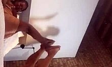 Ebony couple engages in intimate foot play on webcam with friend watching.