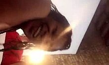 Ebony couple engages in intimate foot play on webcam with friend watching.