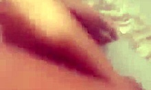 Ebony couple engages in intimate foot play on webcam with friend watching.