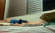 Intriguing solo amateur strokes his tattooed cock alone.