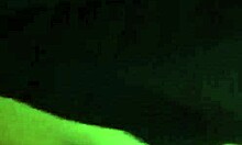 amateur latina poses in front of mirror with black dress