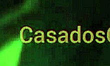 amateur latina poses in front of mirror with black dress