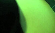 amateur latina poses in front of mirror with black dress