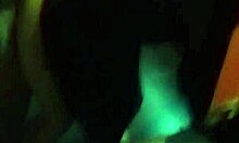 amateur latina poses in front of mirror with black dress