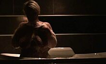 in the bath, this chubby bbw amateur starts a striptease, ripping her clothes to play with her big boobs