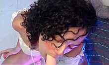 i smoke a cigarette while dominating my dildo with a deep blowjob, showing off my curly hair and sexy legs