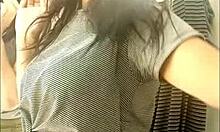 Sarah Rosa Tries on Clothes in the Store Fitting Room