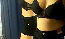 Sarah Rosa Tries on Clothes in the Store Fitting Room