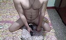 Close-up of a young guy's hardcore sex with his new toy