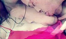 outdoor titty licking adventure with a sexy couple in a garage setting