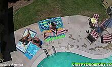 watch these lesbians getting filmed by a drone at the pool