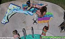 watch these lesbians getting filmed by a drone at the pool