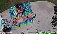watch these lesbians getting filmed by a drone at the pool