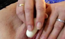 Betty Belle playing with her anal dildos