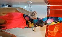 pee and close-up dildo masturbation in gym shower