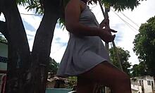 Damn, neighbor’s tiny dress shows off her huge ass while sweeping outside. Wanna lick that pussy?