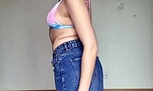 Teen in skirt and swimsuit bra shows off