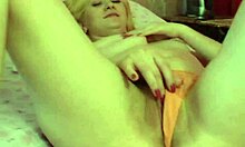 this teen blonde is masturbating her pussy with dildo and sex toy