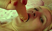 this teen blonde is masturbating her pussy with dildo and sex toy