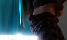 brunette teen slowly undresses in front of the camera