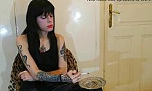 Is Beth the kinky goth domina smoking?