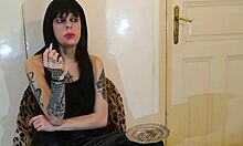 Is Beth the kinky goth domina smoking?