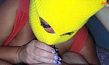 mature woman in mask performs oral act