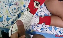 girlfriend tempts with shoes and red socks, gives foot massage until climax