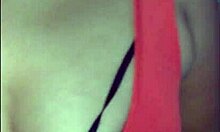 Woman In Red Dress Prepares For Evening Out