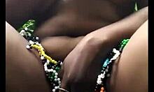 Msanzi ebony babe exposes pussy in the forest