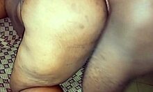 Chubby black lady shows her wide ass.