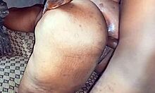 Chubby black lady shows her wide ass.