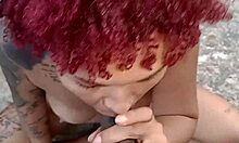 Exhibiting at the beach with a hot blowjob.